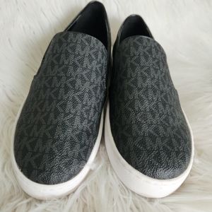 Brand new Michael Kors Black and Gray MK logo slip-on shoes